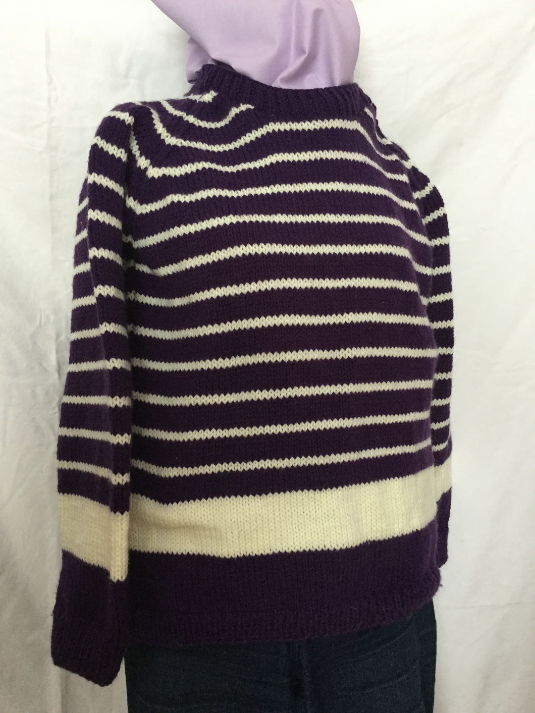 breton style hand knitted pullover in purple and natural white