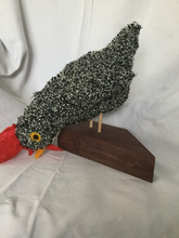 rug hooked barred rock hen sculpture mounted on a wooden pine base